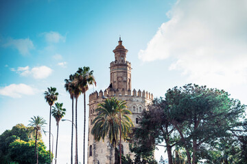 Fototapeta na wymiar Tower of Gold (Torre del Oro) is a dodecagonal military watchtower in Seville, Spain