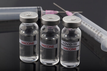 Covid-19 Corona Virus vaccine vials medicine drug bottles.