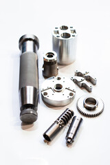 Metal parts after metalworking in an industrial machine. Spare parts for repair