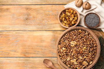 Traditional Christmas slavic dish kutia served on wooden table, flat lay. Space for text