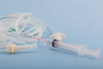 Medical intravenous infusion set isolated on white background.