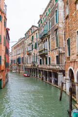 Ancient houses in the channels of Venice, Venetian, Italy