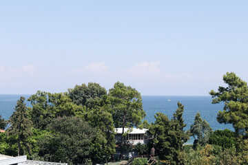 Fototapeta na wymiar View of the coastal hotel, beautiful holiday overlooking the sea