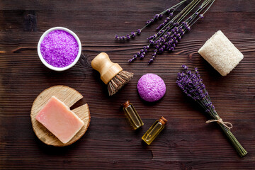 Fototapeta na wymiar Lavender essential oil soap and sea salt, top view