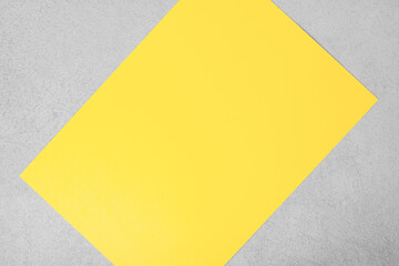 Abstract geometric paper and concrete textured background. Trendy yellow and gray colors 2021, active line.