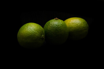 Lime fruit on dark background