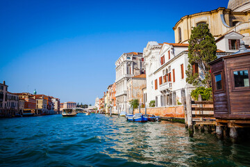 Fototapeta na wymiar Ancient houses in the channels of Venice, Venetian, Italy