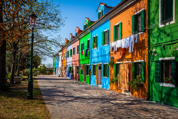 Fototapeta na wymiar Colourful houses in the village of Burano, small island in the bay of Venice, Italy