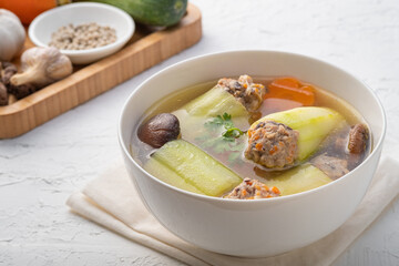 Stuffed Cucumber with minced pork soup (Gang Jued Tang Gwa Yad Sai) ,Clear soup combined with cucumber filled with marinated minced pork shiitake and carrot.