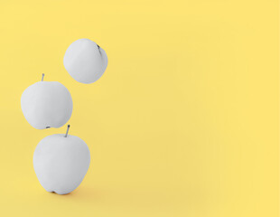 Ultimate Gray apples on a Illuminating Yellow background in levitation in trendy 2021 new colors. bright juicy fruits. Color of the Year 2021. Design element for prints, backgrounds, template