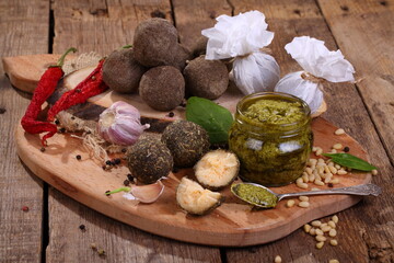 Shanklish and belper cheeses on a wooden table