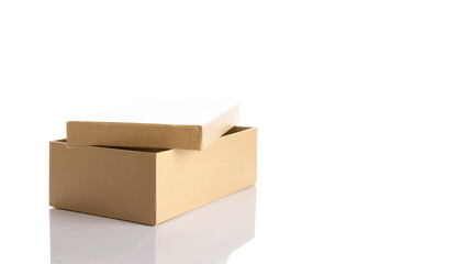 Cardboard box. Brown carton package isolated on white background for shipping delivery. Craft paper object with clipping path.