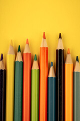Colored pencils On a multi-colored background