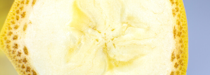 Close up photo of banana on white background. Bananas fruit cut in half, macro view.