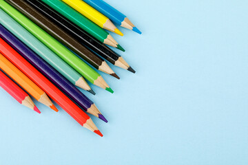 Colored pencils On a multi-colored background