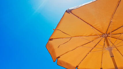 A parasol offers protection from the intense mid day sun on the island of Tenerife