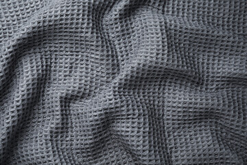 Soft warm blue plaid as background, closeup