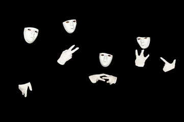 Some duded wearing white masks and gloves over a black background.