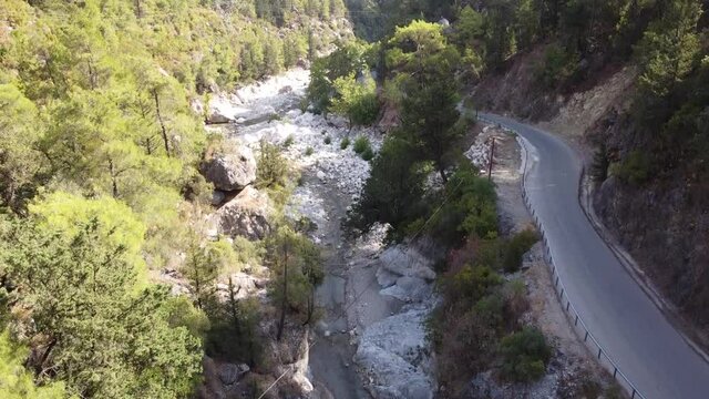 Beautiful small road near a river in Demre, Turkey.