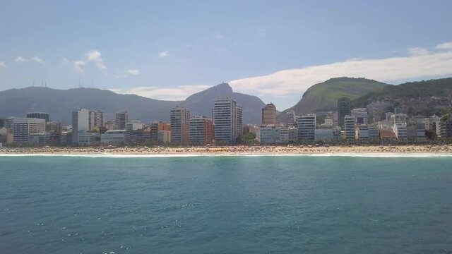 drone flight near Ipanema Beach a  in Rio de Janeiro south zone distant view of crist
