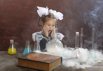 Schoolgirl conduct experiments in the office of chemistry