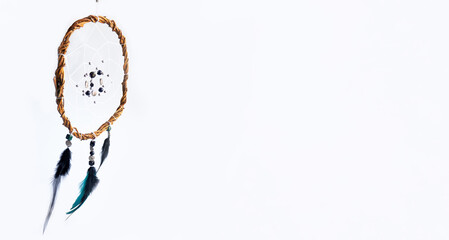 Home decor in Scandinavian style. A unique mystical dream catcher made of willow vines, white...