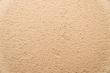 Texture of a sandy beach seen from above, wallpaper