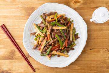 Chinese-style stir-fry containing green peppers and meat