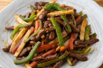 Chinese-style stir-fry containing green peppers and meat