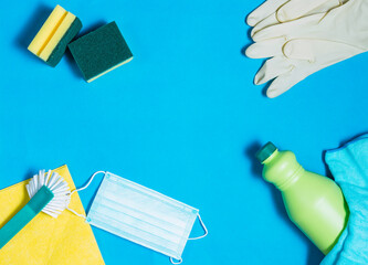 
Still life of cleaning products on blue background
