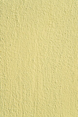 Abstract yellow grunge cement wall texture background.
