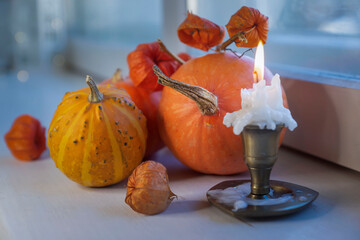 Still life, bright autumn pumpkins on the window. Halloween.