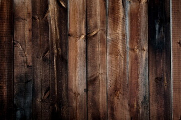 Dunkle braune Bretter aus Holz als Hintergrund Textur