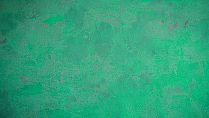 Fototapeta na wymiar Verwitterte alte Steinwand als Hintergrund in grün