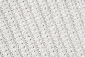 White knitted wool fabric texture background