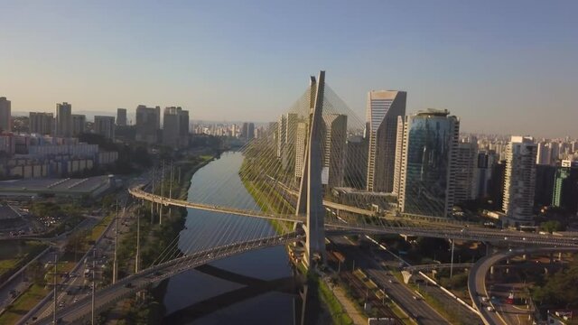 drone flight near estaiada bridge in S&atilde;o Paulo during a sunset on a busy day