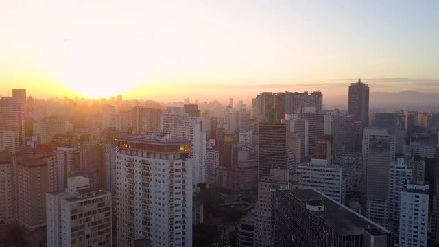 flight over City centre Of Sao Paulo, near republica at sunset