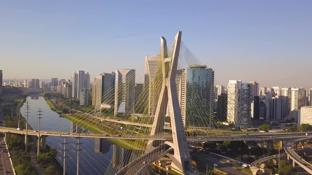 drone flight with a view of estaiada bridge in S&atilde;o Paulo during a sunset on a busy day