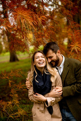 Young couple in the autumn park