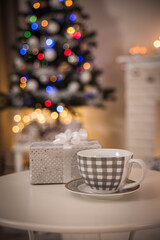 Cosy interior with a fireplace decorated in Christmas style
