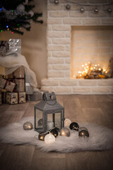 Cosy interior with a fireplace decorated in Christmas style