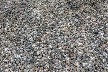 Natural Gray Granite Chippings, Macadam, Rubble or Crushed Stones Background Top View.