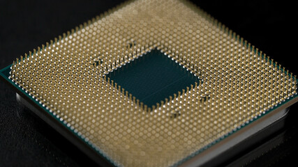 Powerful central processing unit presented in macro. Contact feet are gold plated for less...