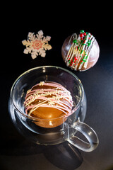 chocolate balls with cocoa and marshmallows in New Year's decoration