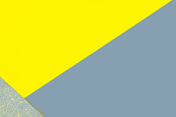 Demonstrating trendy colors 2021 - Gray and Yellow. Paper geometric background with copy space.