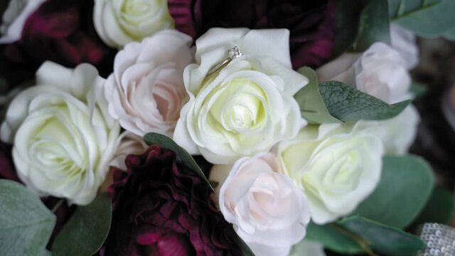 Gorgeous bouquet bridal detail layout with diamond jewelry.