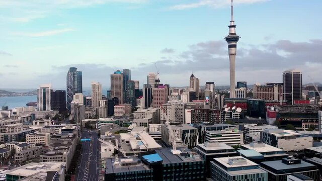 The Auckland central business district geographical and economic heart. Aerial  pull back shot in the evening.