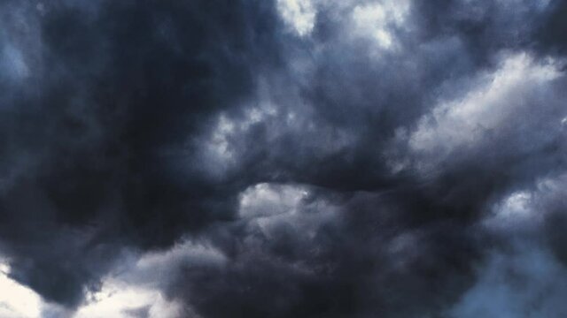 The thunderstorm within the dark clouds moved with their lightning bolts