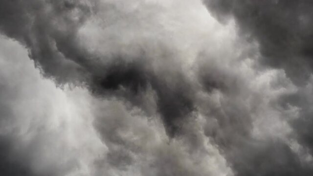 a thunderstorm inside the gray cumulus cloud and moved closer.
