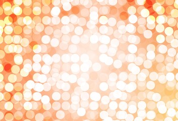 Light Orange vector pattern with spheres.